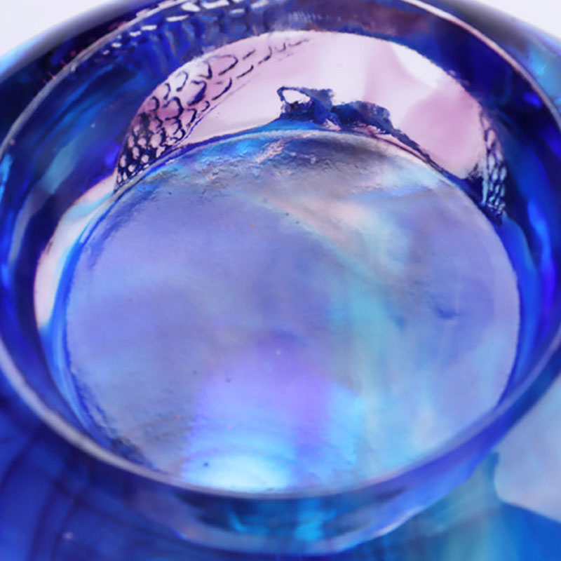 নীল রঙের চকচকে স্ফটিক খোদাই করা মোমবাতি ধারক